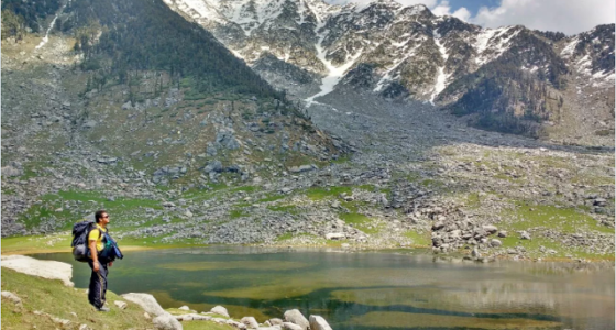 Man Standing on the banks of Kareri Lake